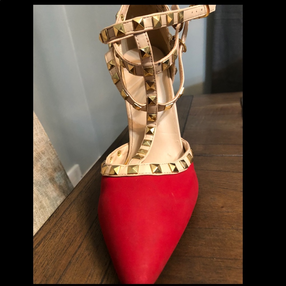 Red studded pump heels. Brand new never worn.